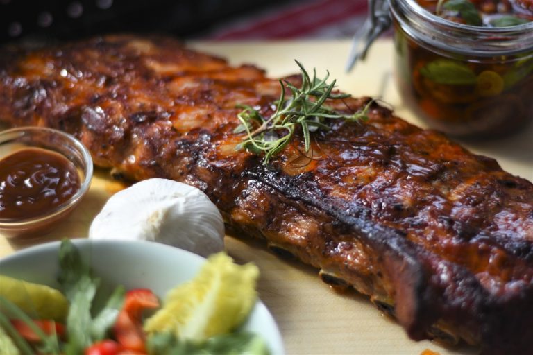 grilled bbq sauce spare pork ribs topped with herbs types of ribs