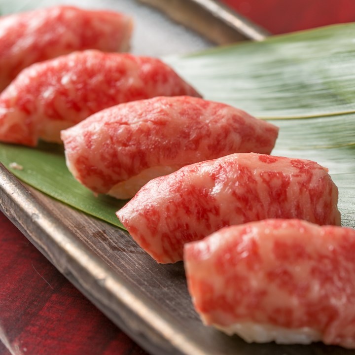 A4 Wagyu Sushi raw on a Japanese style plate