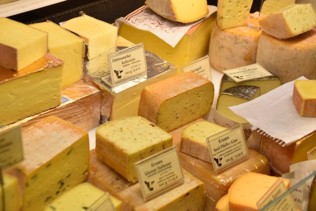 different types of cheese in a cheese store