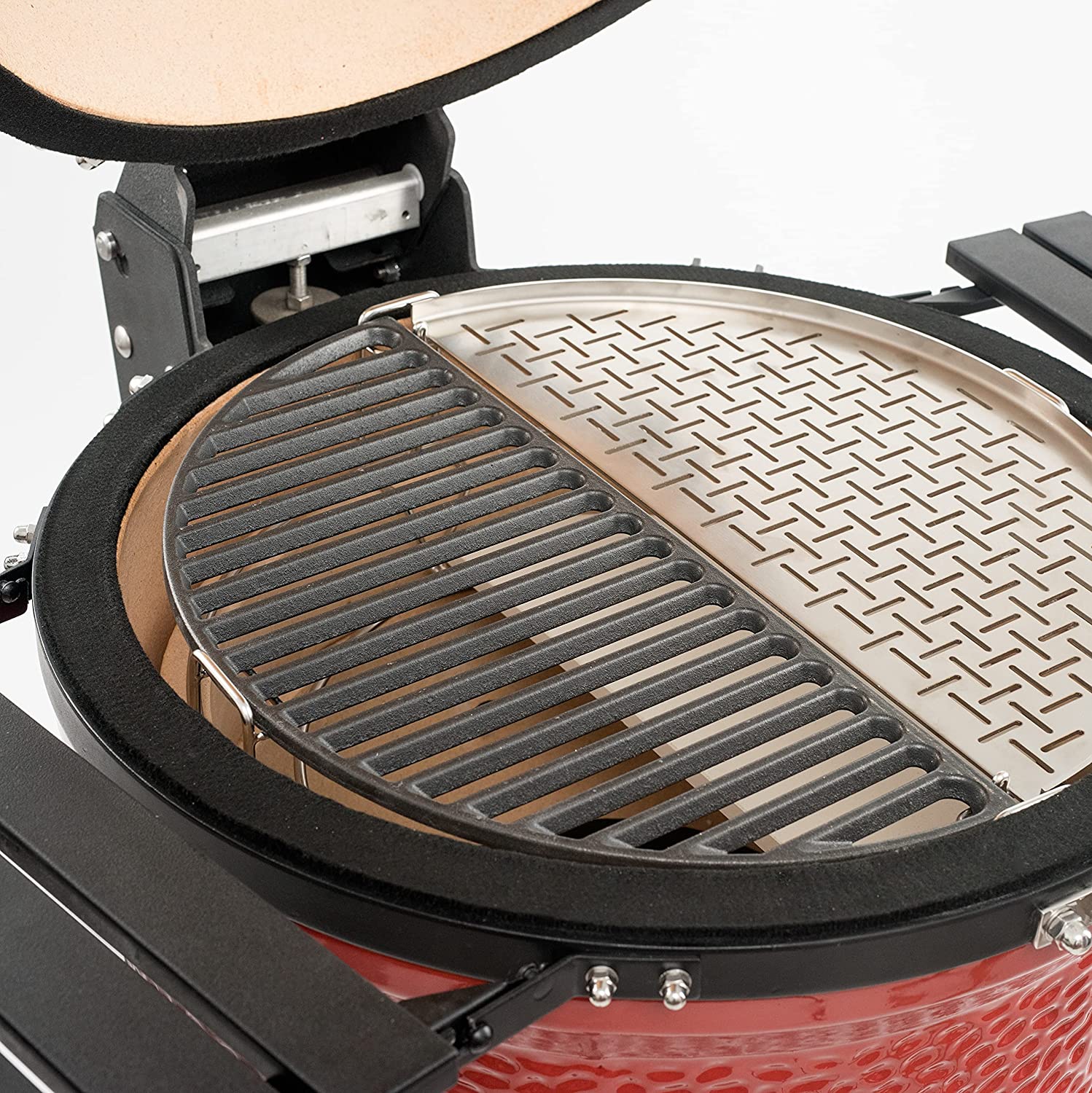 Half moon cast iron cooking grate and stainless steel surface in Kamado Joe Classic II
