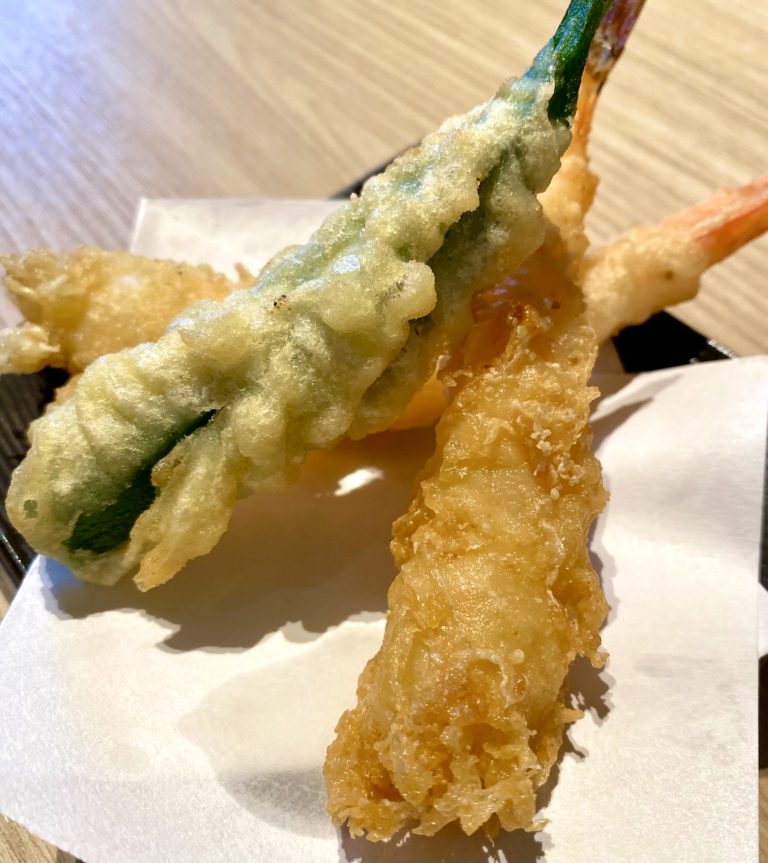 Recipe for Tempura Shrimp and okra on cooking paper on wooden table