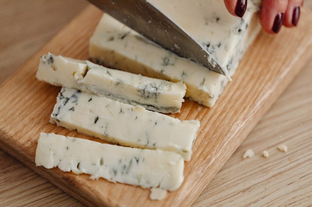 Gorgonzola Cheese on wooden cutting board