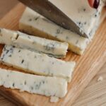 Gorgonzola Cheese on wooden cutting board