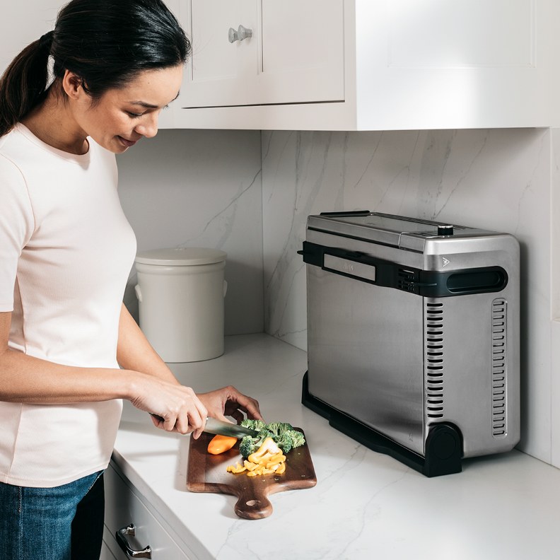 https://kitchenteller.com/wp-content/uploads/2023/04/Space-Saving-Flip-Up-and-Away-Feature-of-Ninja-SP201-Digital-Air-Fry-Pro-8-in-1-Oven-review.jpeg